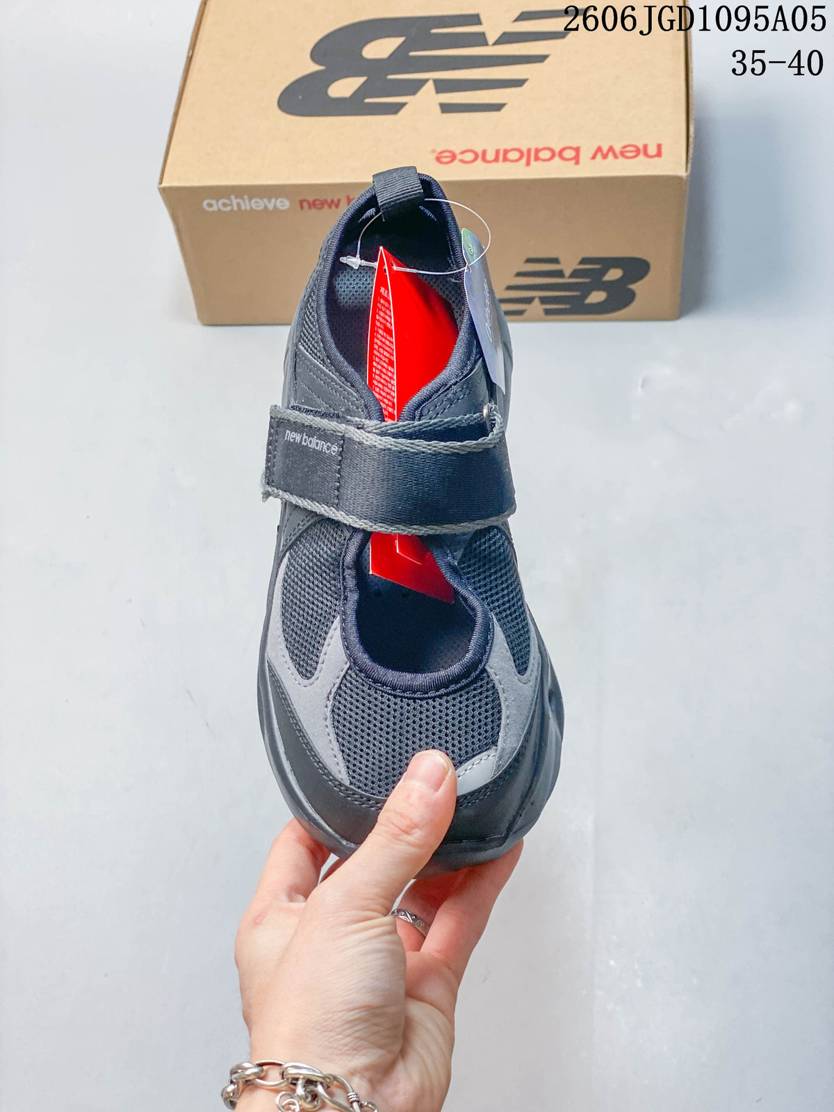 Top view showing the mesh panels and hook-and-loop strap on a gray sneaker