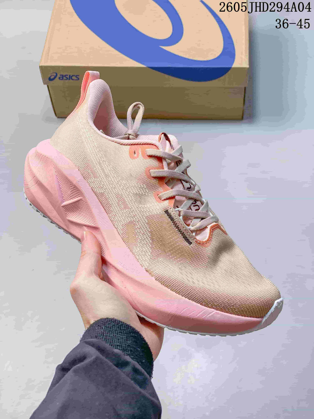 Pale pink and cream ASICS NOVABLAST 5 LE running shoe, side view