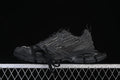 Black Balenciaga 10XL sneaker shown in profile on a display stand.