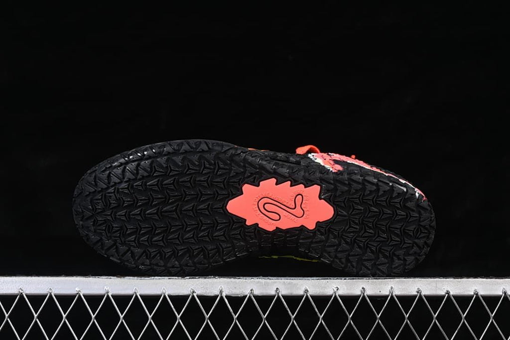 Outsole view showing the black patterned tread and colored center detail.