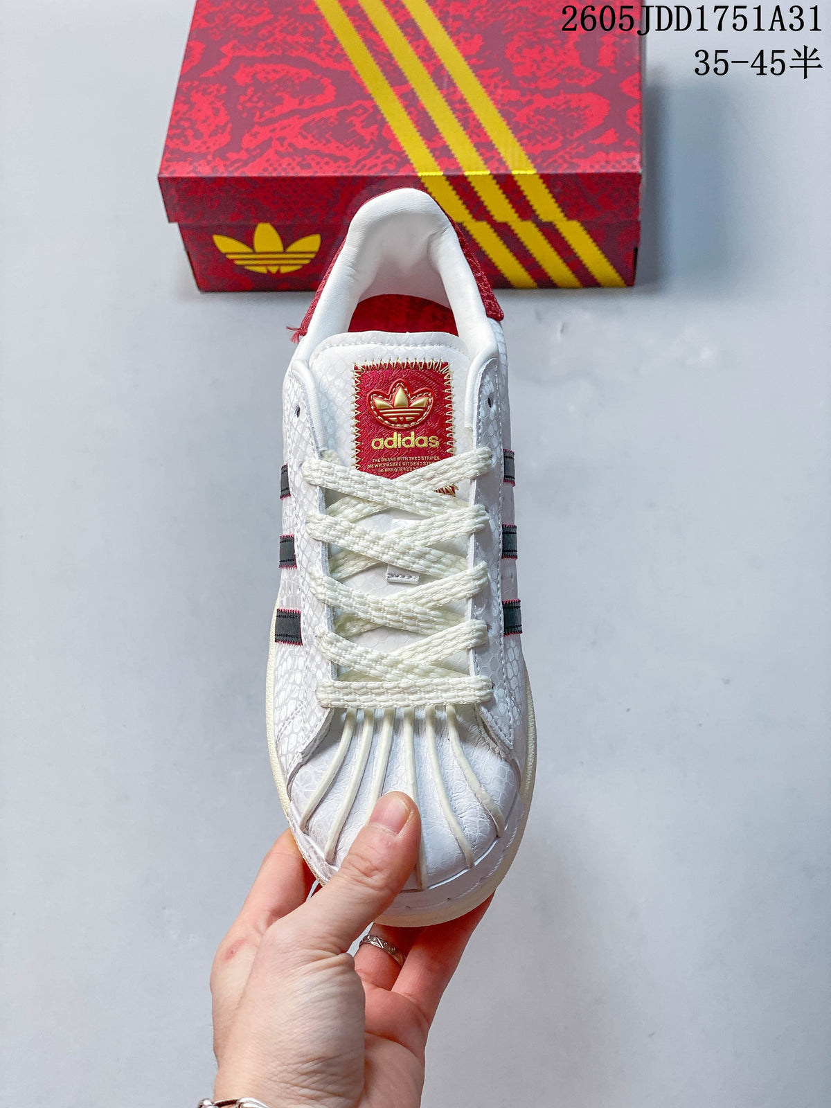 Top view showing the shell toe, laces, and red tongue label