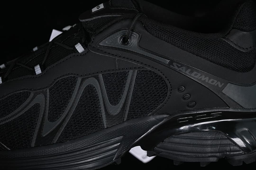 Close-up of the black side panels and shoe lacing