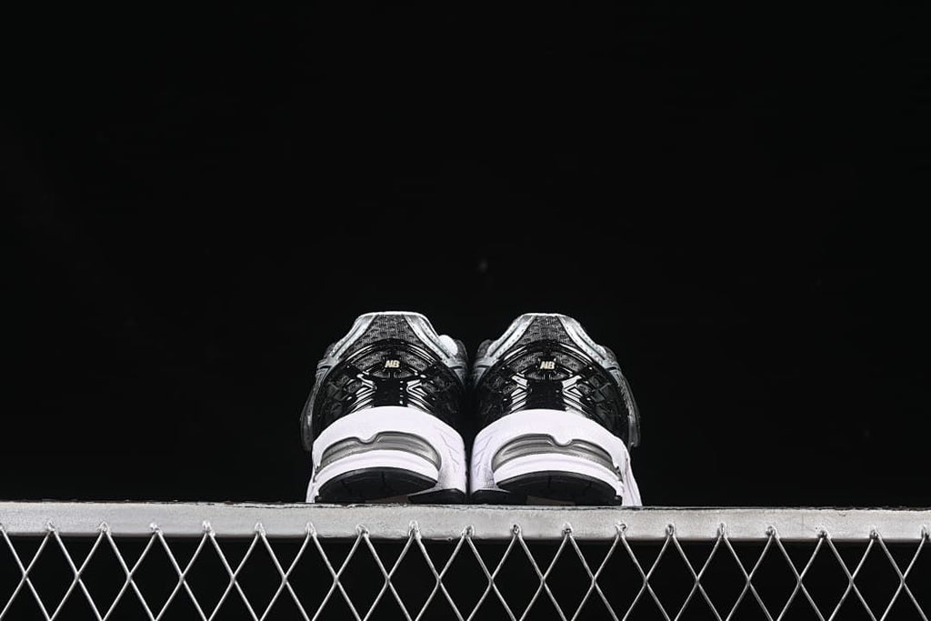 Rear view of the pair showing the heels and midsoles