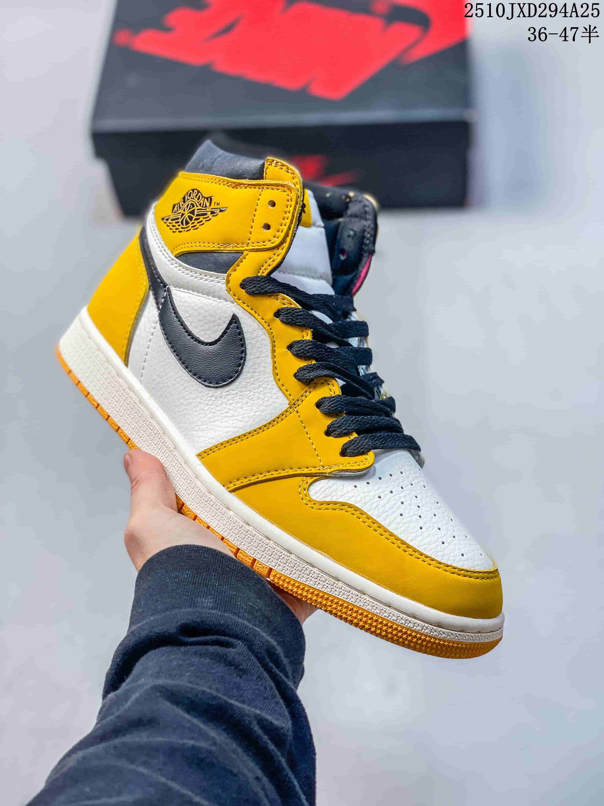 Yellow, white, and black high-top sneaker with a perforated toe