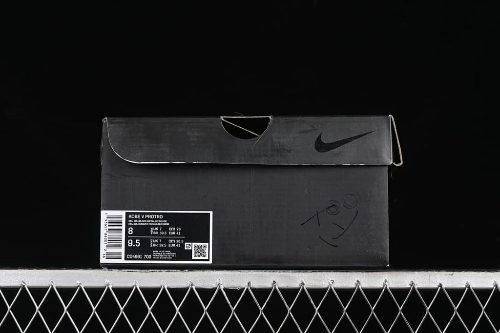 Black shoe box with a visible Kobe V Protro product label