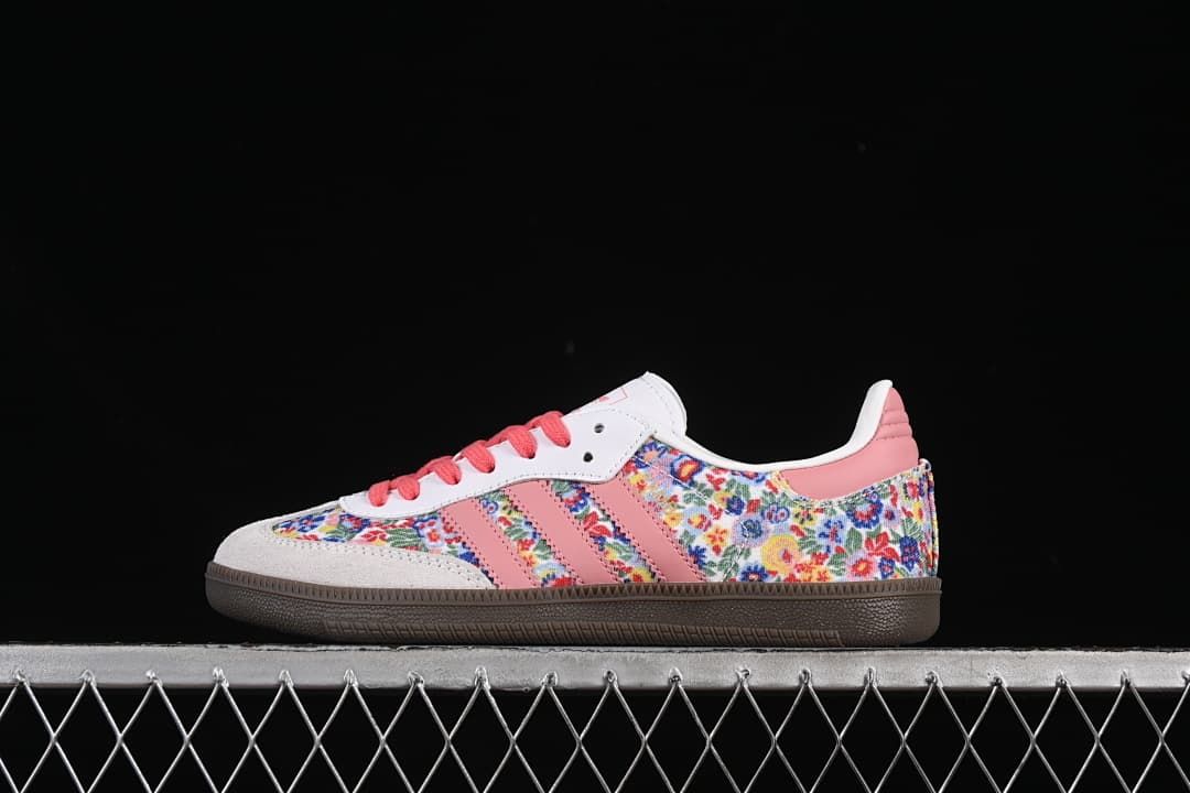Side view of Samba OG W sneakers with floral-print panels, pink stripes and laces, and a dark brown sole