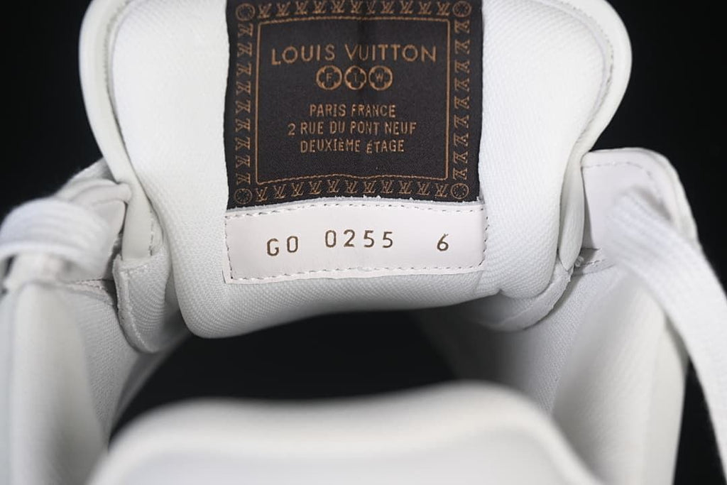 Sneaker tongue label and size marking reading 6