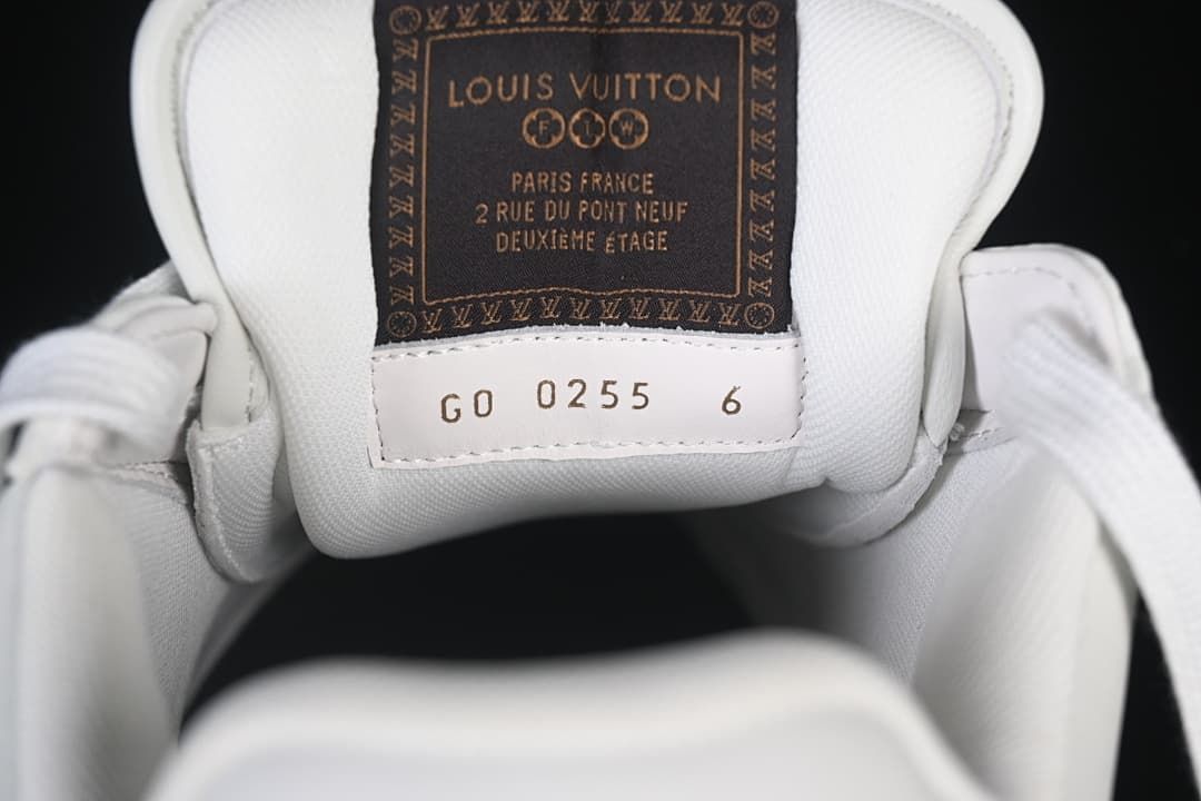 Sneaker tongue label and size marking reading 6