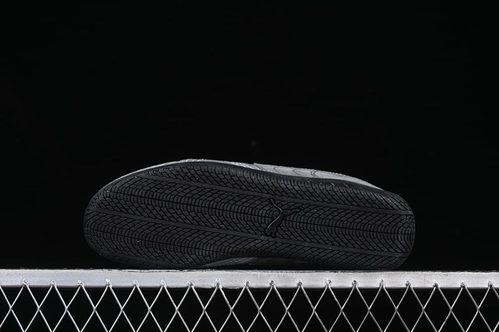 Bottom view showing the black treaded outsole