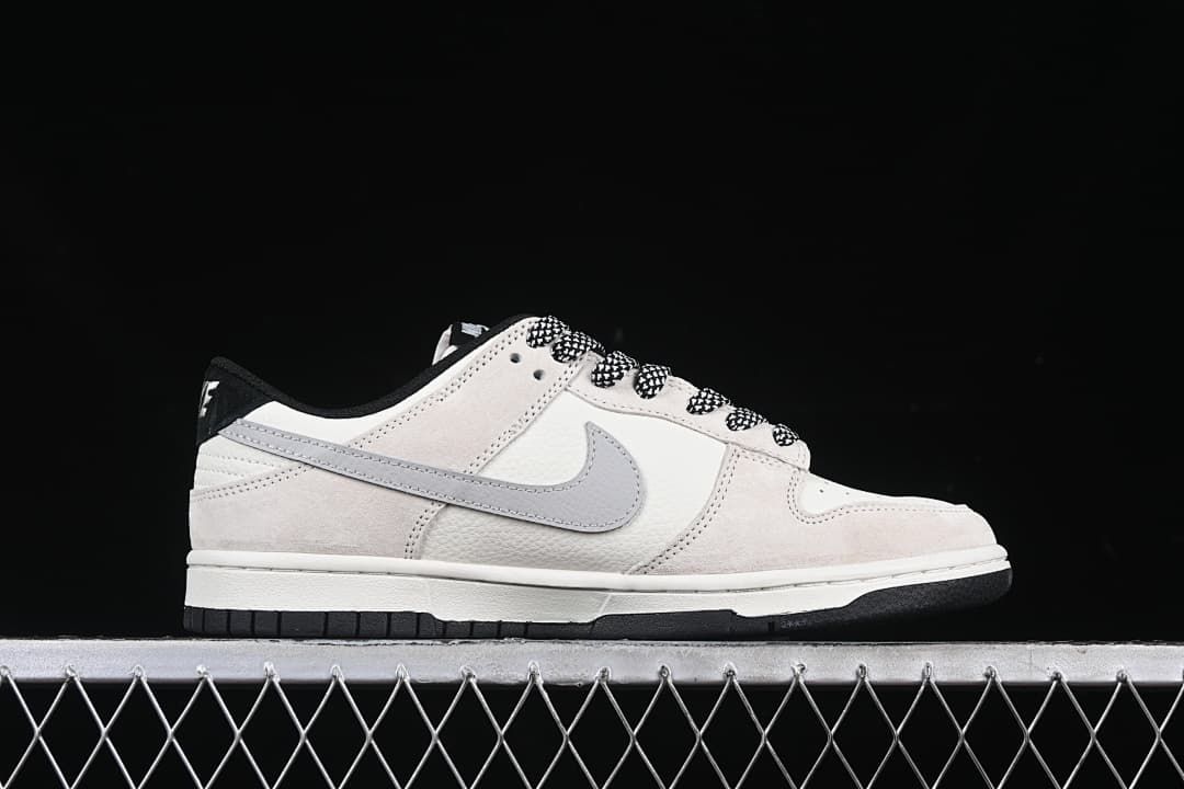 Side profile showing the grey Swoosh and off-white upper
