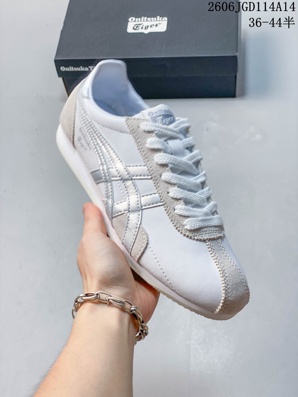 Angled view of the white and silver Runspark sneaker