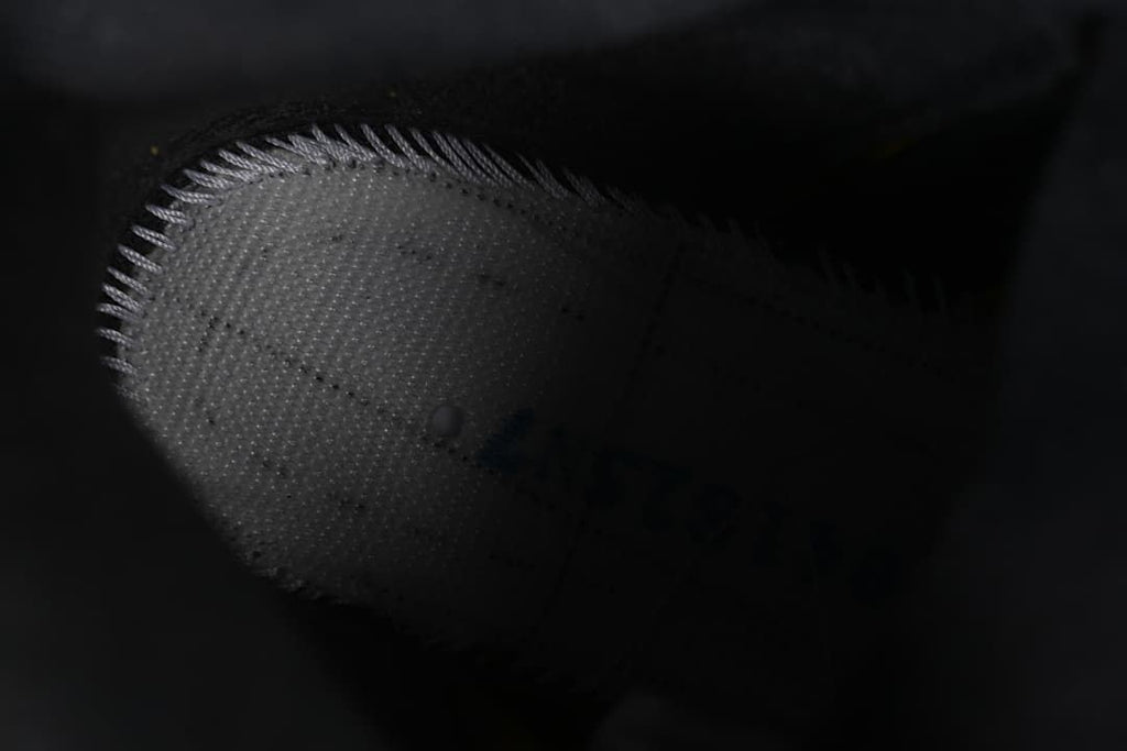Close-up of the sneaker's perforated side panel
