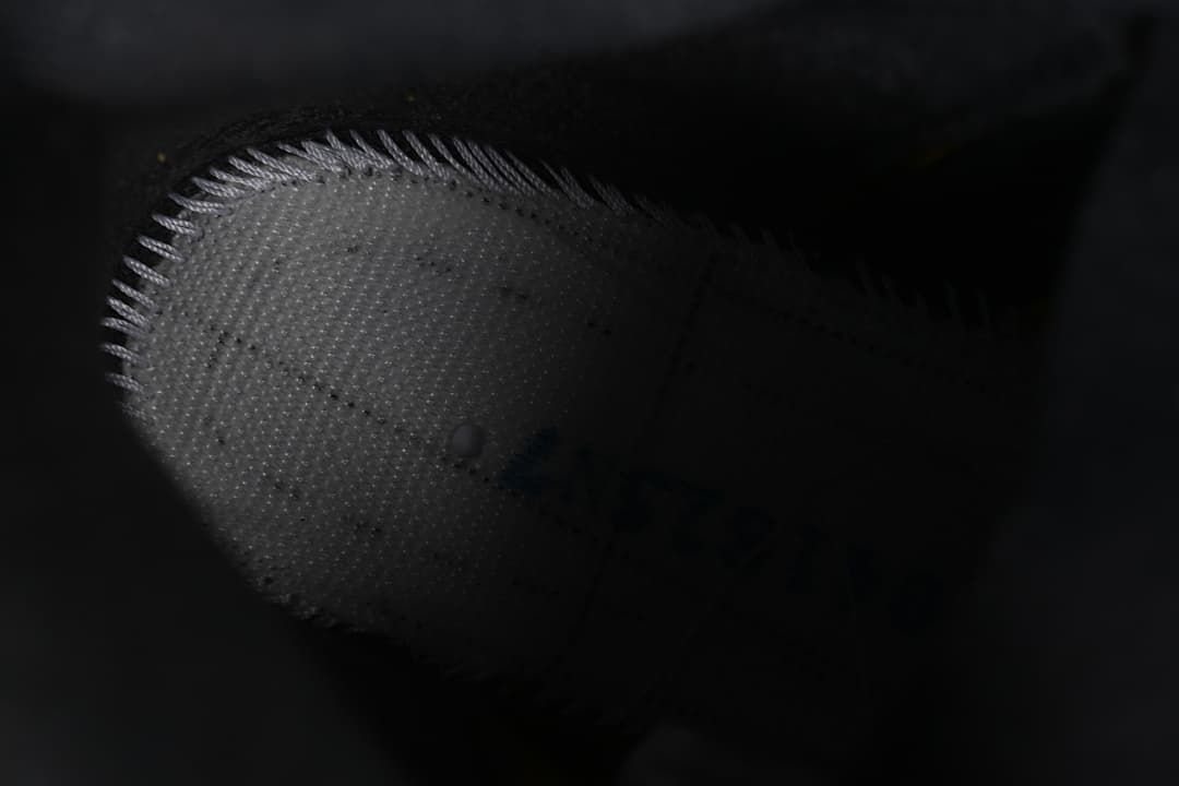 Close-up of the sneaker's perforated side panel