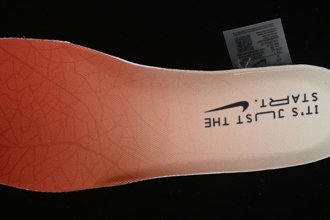 Printed shoe insole with Nike branding, shown beside a size label