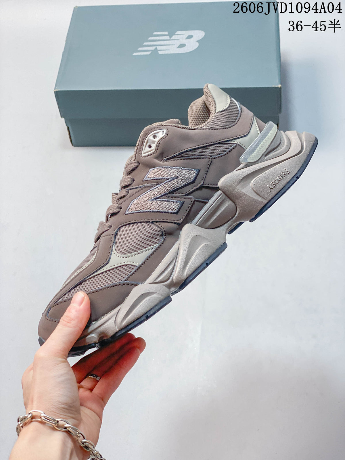 Side profile showing layered panels and mesh sections on a taupe sneaker