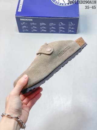 Side profile showing the suede upper, rear strap detail and textured outsole.