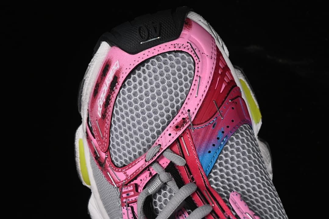 Top view highlighting the mesh-look panels and pink overlays