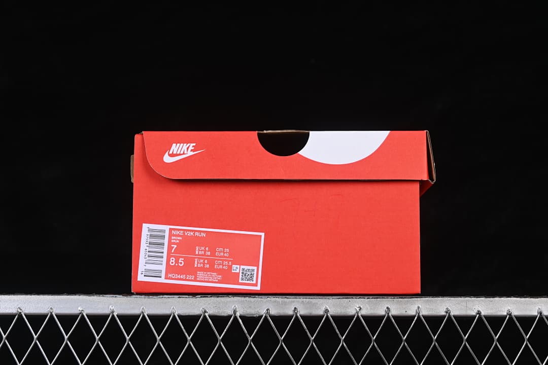 Red shoe box label identifying Nike V2K Run and model HQ3445-222