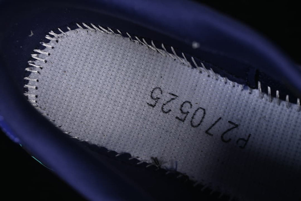 Close-up of the shoe's inner footbed label, with a printed size code.