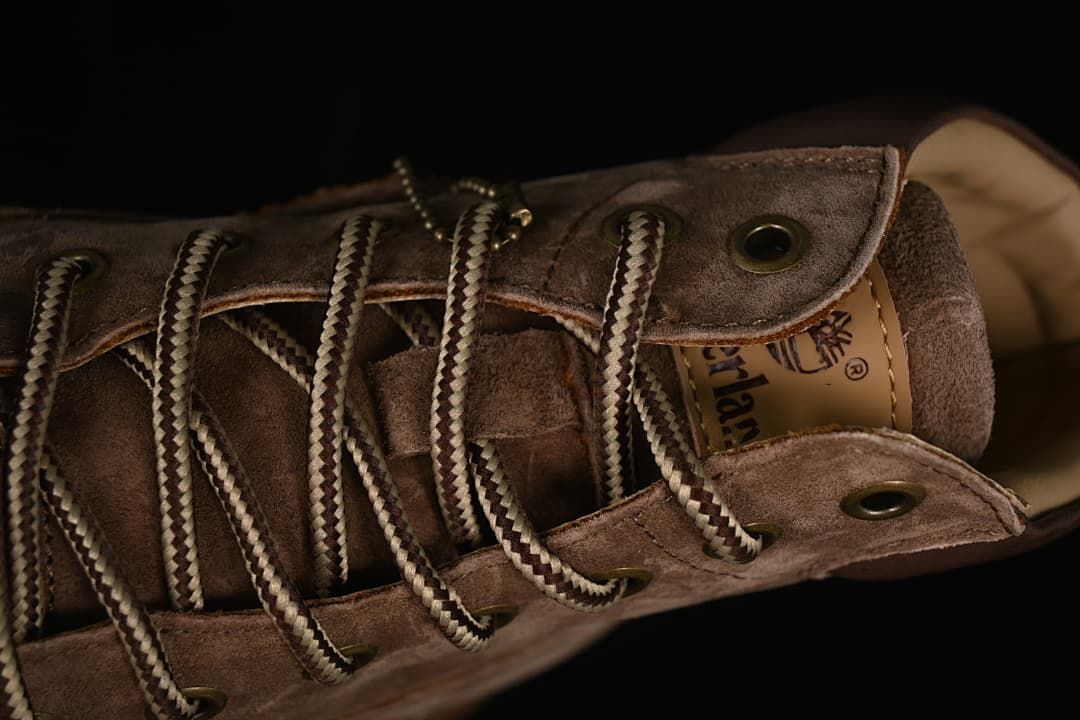 Top close-up of the boot laces and metal eyelets