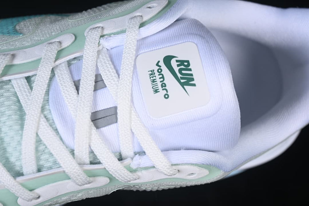 Close-up of the tongue, laces and pale mint lace supports