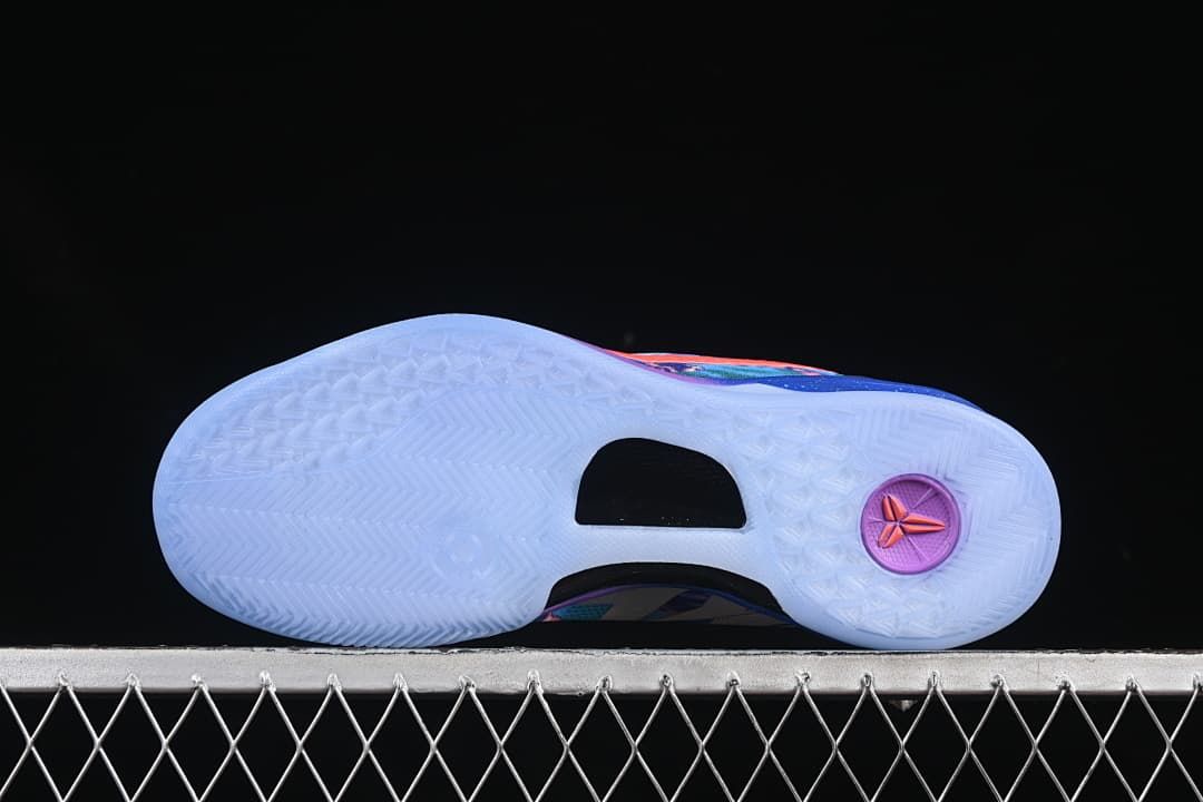 Underside of blue shoe showing translucent outsole and tread
