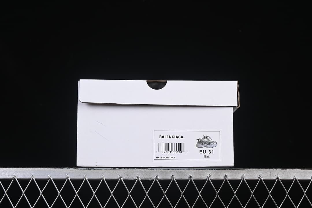Shoebox label showing Balenciaga, EU 31, and silver color text