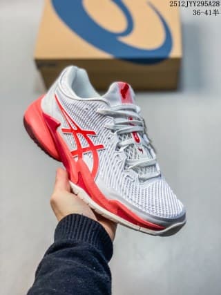 Angled side view of the white and red ASICS SKY ELITE FF 3 sneaker with visible side branding and layered sole.