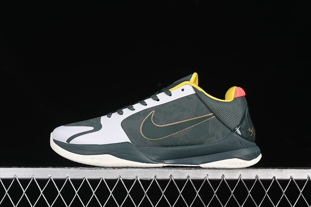 Side view of a dark green, white, yellow, and coral Nike Kobe 5 basketball shoe