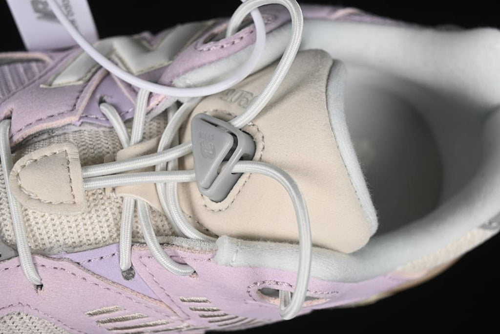 Close-up of the lace-up fastening and tongue