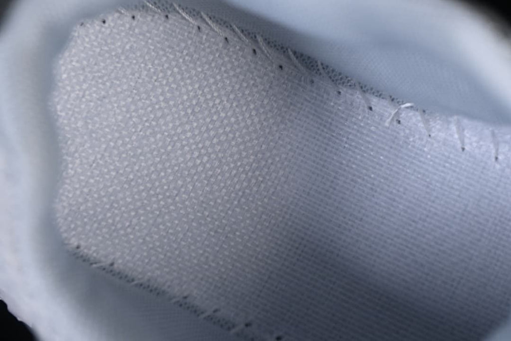 Close-up of the sneaker’s light-colored interior lining