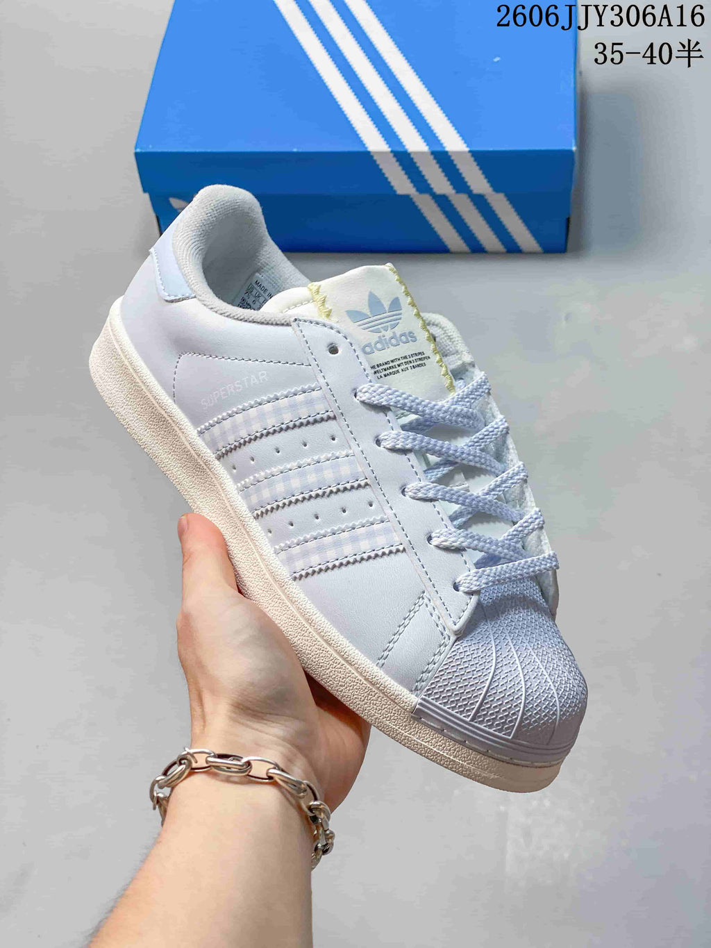Close side view showing the Superstar II name and pale blue details