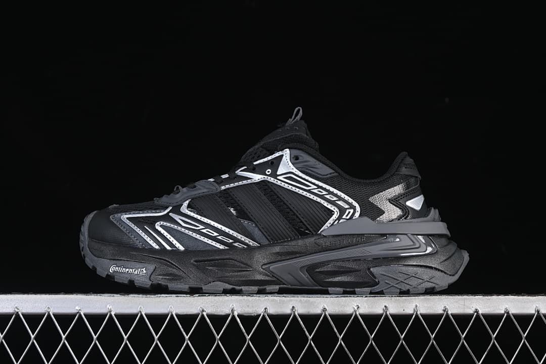 Side view of the black adidas XLG Storm Edge sneaker with grey and silver accents
