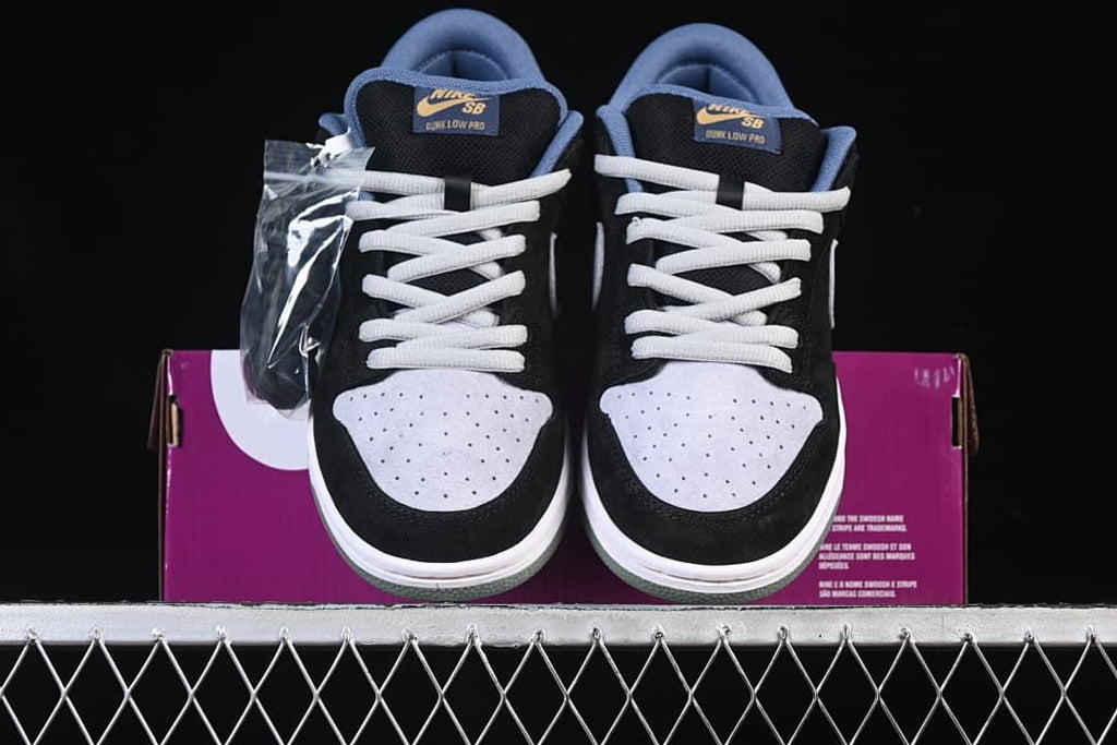 Front view of the pair showing perforated grey toe panels and light laces