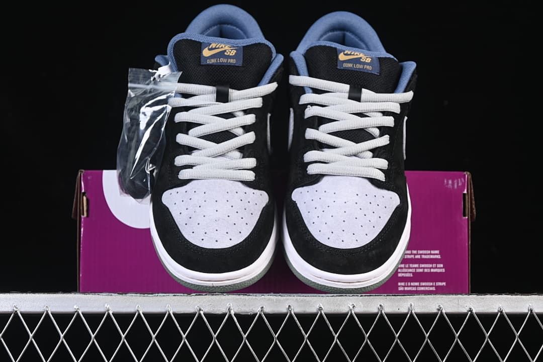 Front view of the pair showing perforated grey toe panels and light laces