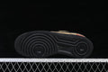 Underside of a black-soled low-top sneaker