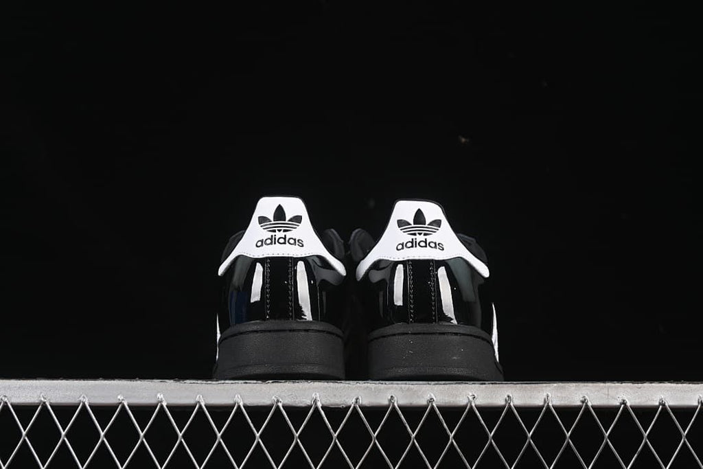 Rear view of the pair showing white branded heel tabs