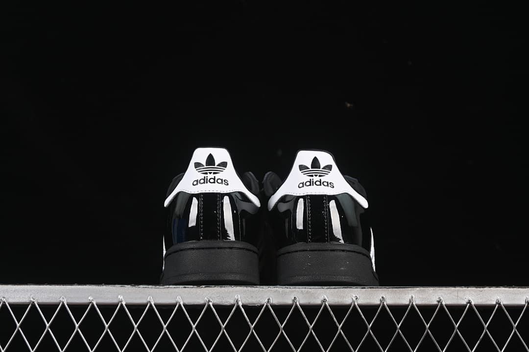 Rear view of the pair showing white branded heel tabs