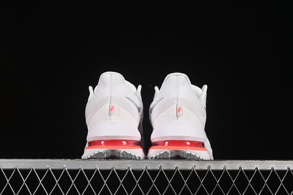 Rear view of the pair showing heel details and red cushioning units.