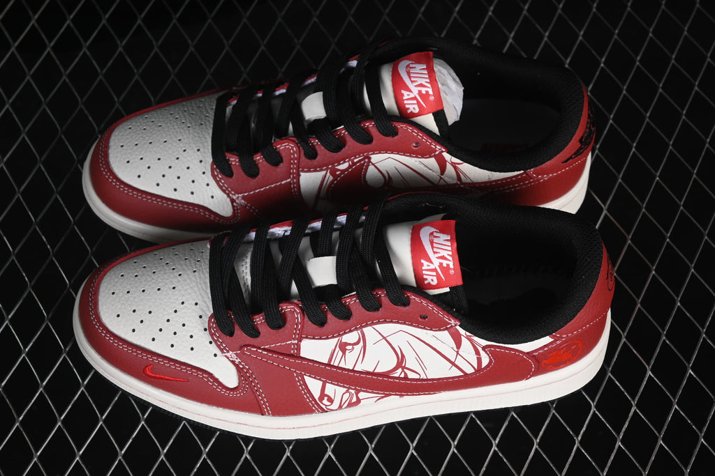Pair of red, white, and black low-top sneakers shown from above, with illustrated side panels.