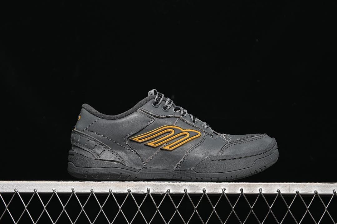 Side profile of the sneaker with layered upper panels