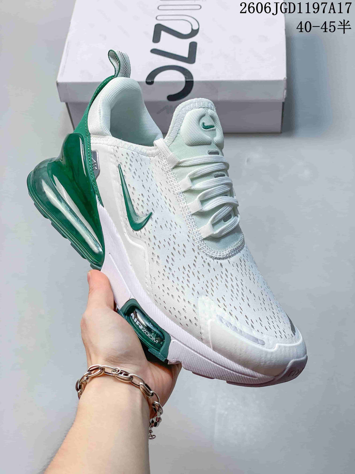 Angled side view of the Nike Air Max Pulse sneaker with green heel cushioning.