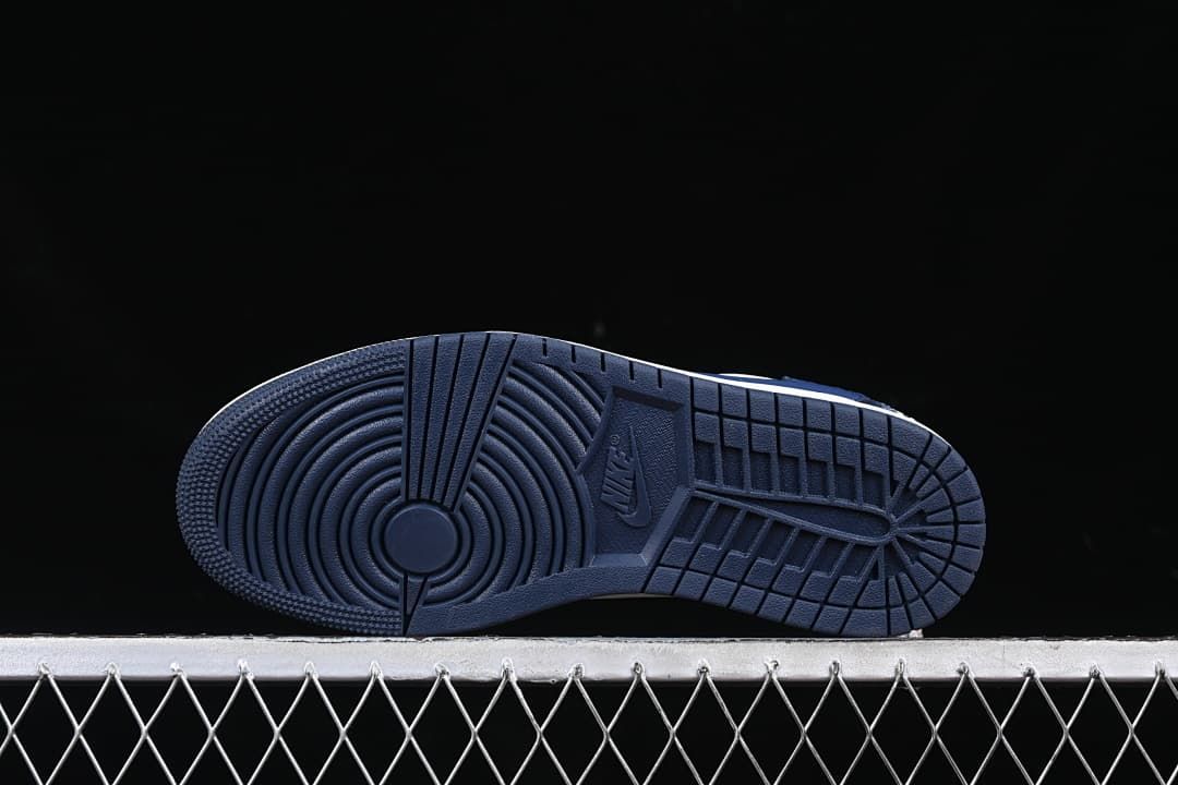 Underside view of the dark blue outsole