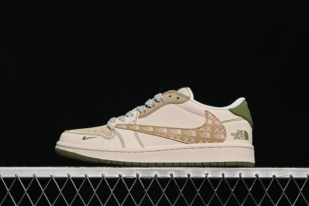 Side view of a cream and beige low-top sneaker with olive-green accents, patterned side panel and laces