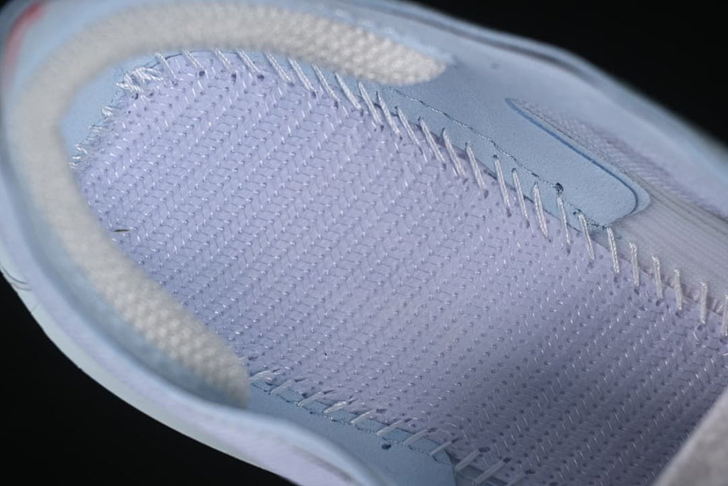 Close-up view of the shoe's upper construction and stitching