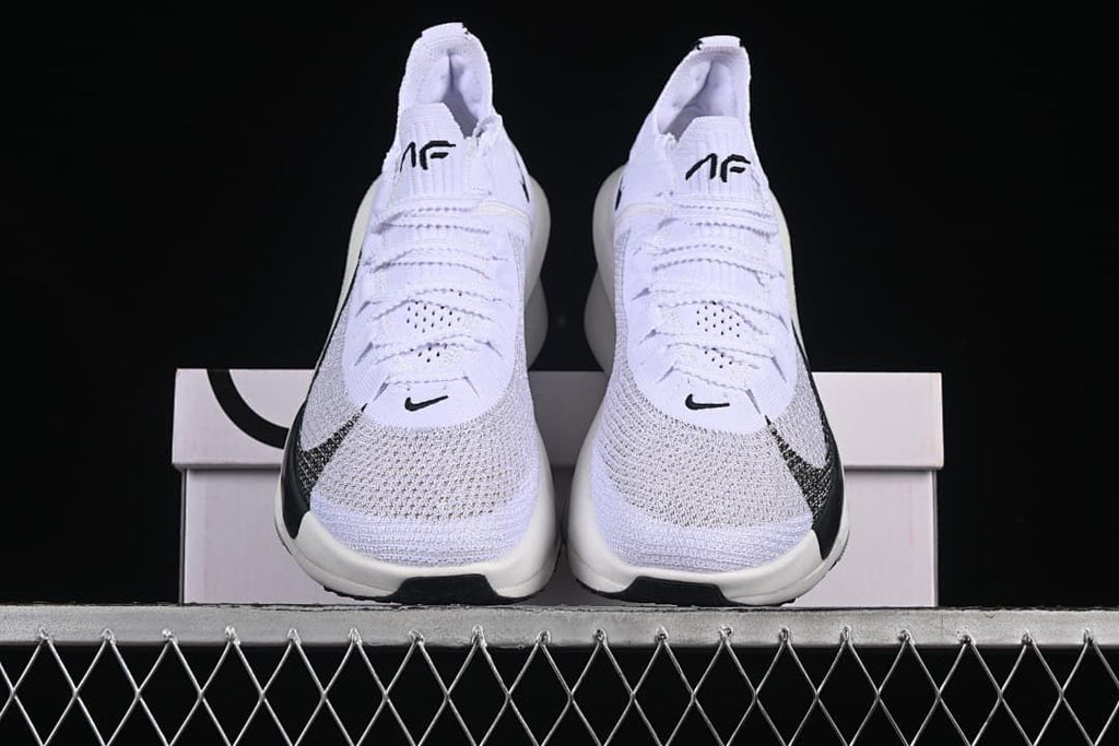 Front view of the pair showing their knit-textured toes
