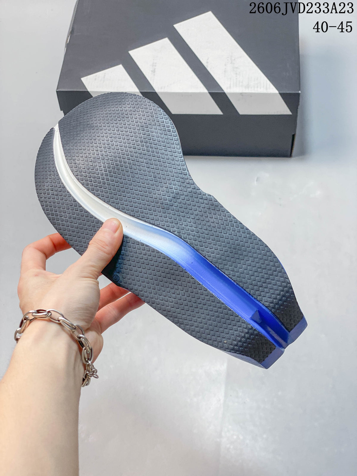 Close-up of the textured outsole with a blue central section.