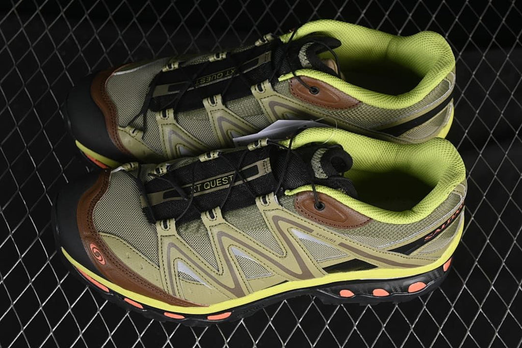 Pair of olive-toned XT-Quest shoes shown from above and the side.