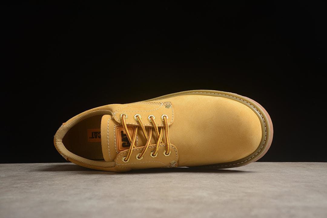 Top-down view of the shoe showing the toe, laces, and collar