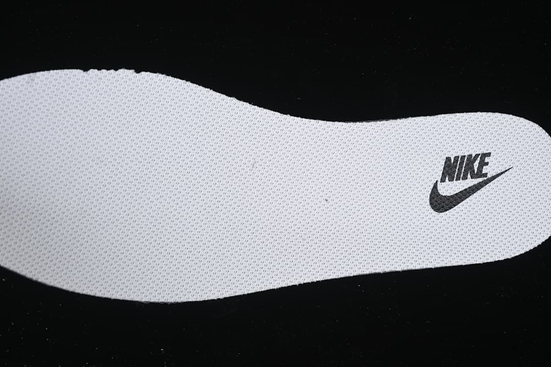 Close-up of a white Nike-branded insole